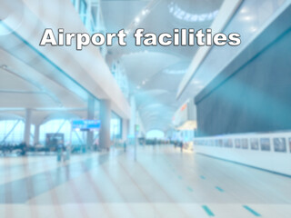 Airport facilities text on a blurry light blue hall
