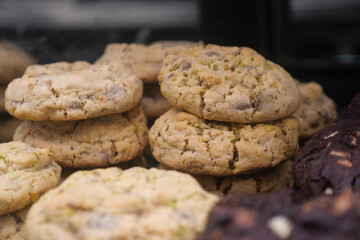 Cookies stacked in a display at a bakery