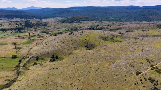 Aerial view of ancient Illyrian hillfort remains with circular stone wall on Glasinac plateau