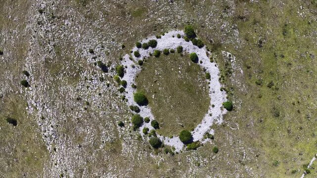Top drone shot of prehistoric Illyrian fort on Glasinac, showing circular stone fortification