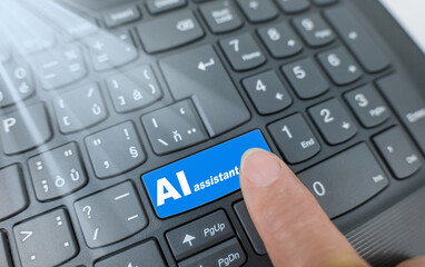 AI assistant key on a violet keyboard. Finger pressing key