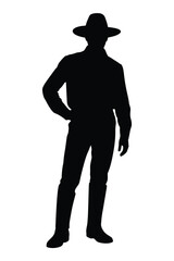 Silhouette of a cowboy standing with hand on hip