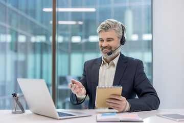 Professional businessman conducting a video conference call in a modern office setting