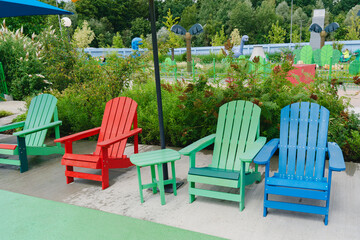 Colorful Adirondack Chairs in Park Setting