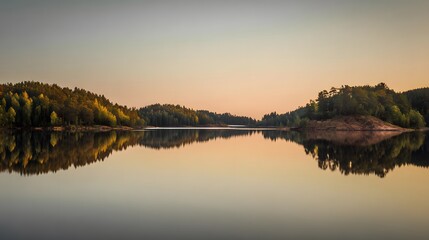 A serene lake mirroring golden sunset and forest, creating a perfectly symmetrical dreamscape.
