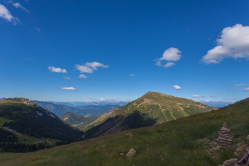 Fototapeta premium Summer panorama of Pala di Santa Peak summit seen from path to Latemar summit. UNESCO world heritage site, Trentino-Alto Adige, Italy, Europe