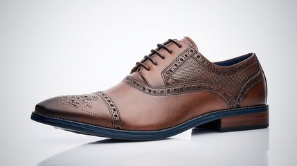 Fototapeta premium Handcrafted leather shoes displayed at an angle, showcasing fine details and timeless fashion appeal.