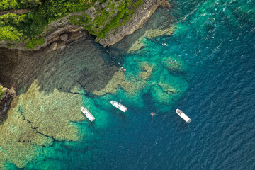Aerial View of Blue Cave (青の洞窟) and Diving Boats at Maeda Misaki, Okinawa, Japan