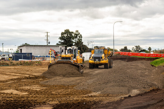 bulldozer and dump truck on construction site with earthworks building Singleton bypass