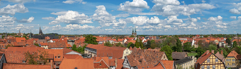 Obraz premium Panoramic view from above of the ancient city of Quedlinburg in Germany. Wide banner format