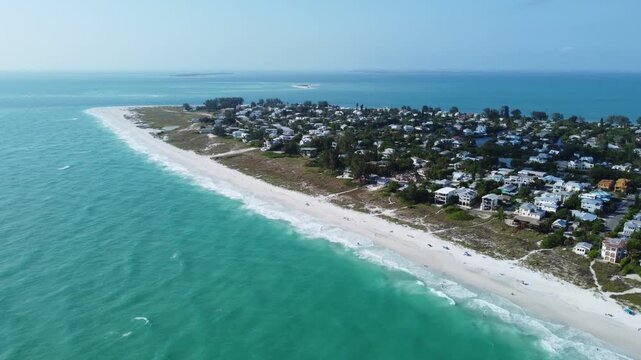 Aerial footage of the coastal buildings along Anna Maria Island Beach on Anna Maria Island, USA