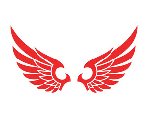 Fototapeta premium Stylized red angel wings spread open on white background