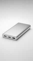 ​A metallic portable charger against a white background, ideal for technology product advertising.
