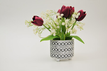 Artificial flower decoration on white background