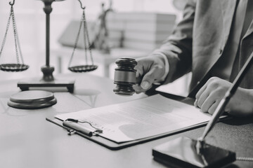 Lawyer explained to the client about the law that must be brought against the court case.