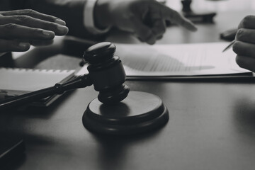 Lawyer explained to the client about the law that must be brought against the court case.