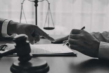 Lawyer explained to the client about the law that must be brought against the court case.
