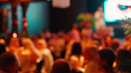 A Blurry Background Featuring a Social Gathering with Soft Lighting, Creating a Vibrant Atmosphere