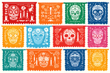 Colorful papel picado banners with sugar skull designs for Día de los Muertos