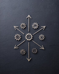 A symmetrical arrangement of gears and arrows on a textured dark surface, symbolizing movement, direction, and mechanical design.