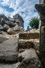 The entrance to the ruins of an ancient theater in the ancient city of Sagalassos in the Aglasun district of Burdur province in Turkey is littered with stone blocks.