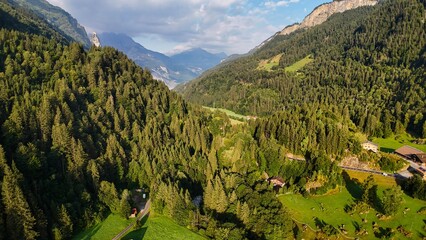 Aerial, panoramic photo of the alpine valley in Switzerland in the summer. 