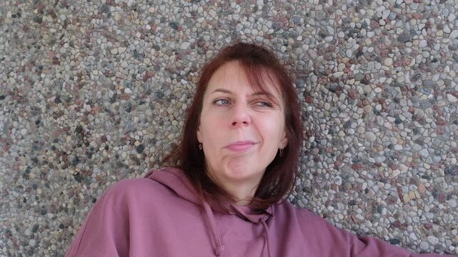 face of angry woman dissatisfied with life and everything that happens. man is grimacing