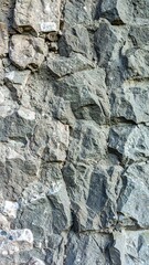 Fototapeta premium Close-up view of rough rock face