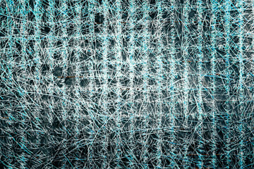 top view of a synthetic fiberboard with traces of blue paint on the old textured surface to be used as a background