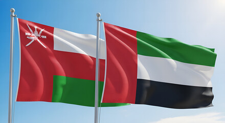 Realistic Waving Flags of Oman and United Arab Emirates on Flagpoles