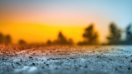 Obraz premium Empty paved ground at sunrise, hazy background