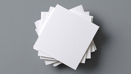 Stacked white squares on gray background