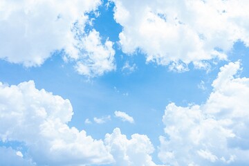 Bright blue sky with fluffy white cumulus clouds A scenic daytime sky view
