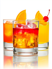 Three vibrant cocktails with fruit garnishes, perfect for summer gatherings and celebrations.