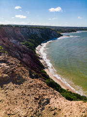Epic aerial-like view of the stunning Cabo Branco cliffs and coastline leading to the city of Jo&atilde;o Pessoa, Para&iacute;ba, Brazil