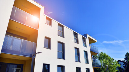 European residential architecture harmonizing with nature. Eco-friendly living in city with greens....