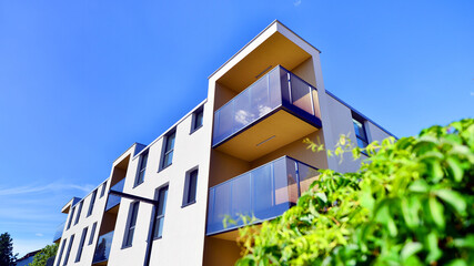 European residential architecture harmonizing with nature. Eco-friendly living in city with greens....