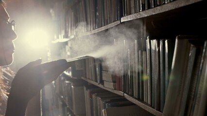 A young girl looking for the right book