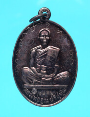 metal amulet coins worshipped by famous monks in thailand