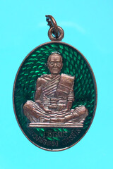 Amulets of famous monks and teachers at Wat Ban Rai, Thailand