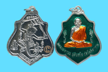 metal amulet coins worshipped by famous monks in thailand
