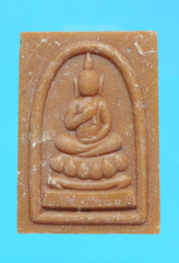 amulets of famous monks are believed in by many people in thailand.