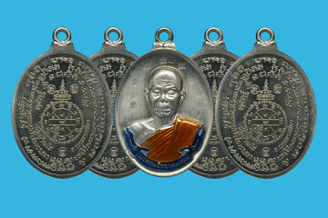Amulets of famous monks and teachers at Wat Ban Rai, Thailand