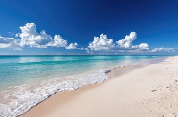 Sunny beach scene with turquoise water and fluffy clouds (1)