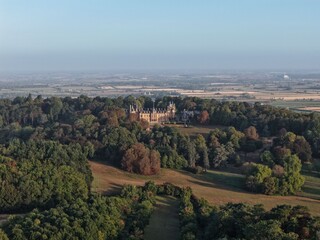 Aerial view of a historic castle in the English countryside.