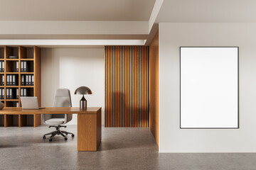 Modern office interior with wooden desk, bookshelf, and vertical slat wall featuring a blank poster mockup on white wall. 3D Rendering. 3D Rendering