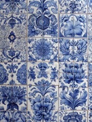 an exquisite wall showcasing hand painted ceramic tiles with traditional floral motifs in blue and white