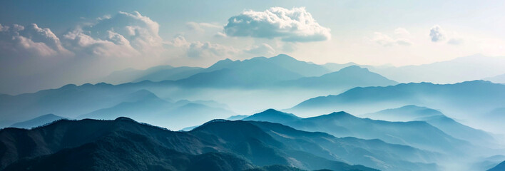 Majestic Mountain Landscape with Dramatic Cloudy Sky and Misty Valleys