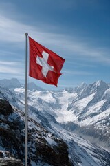 Swiss Flag Waving Against Snowy Alpine Peaks