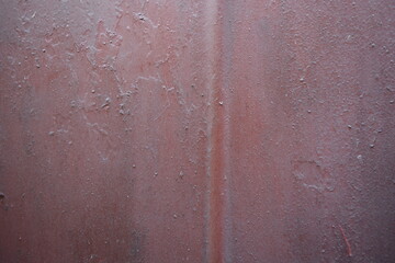 Unusual backgrounds, old thin brown, cherry metal sheet with old stains from old paint.